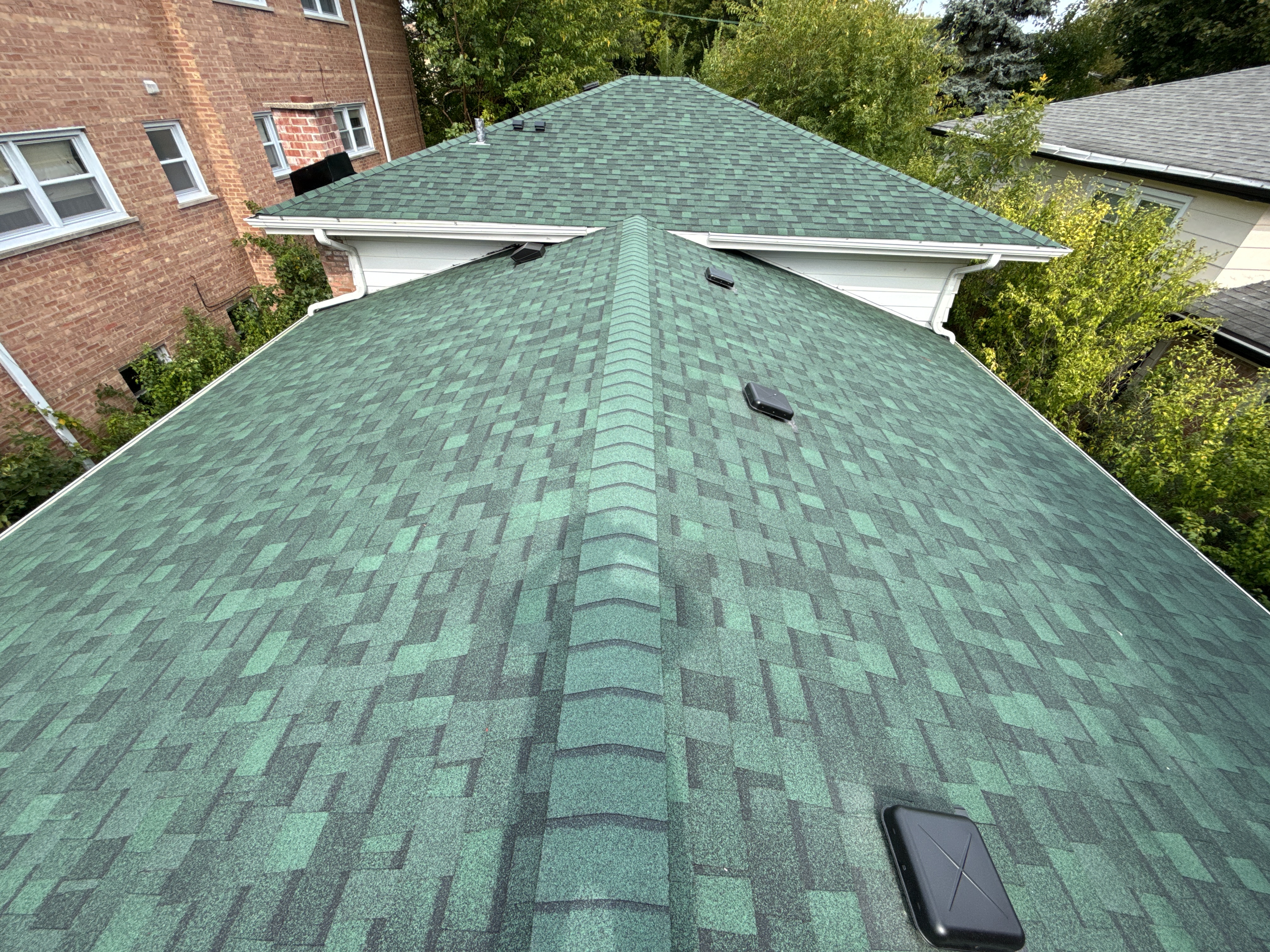 View of residential roof from above the roof.