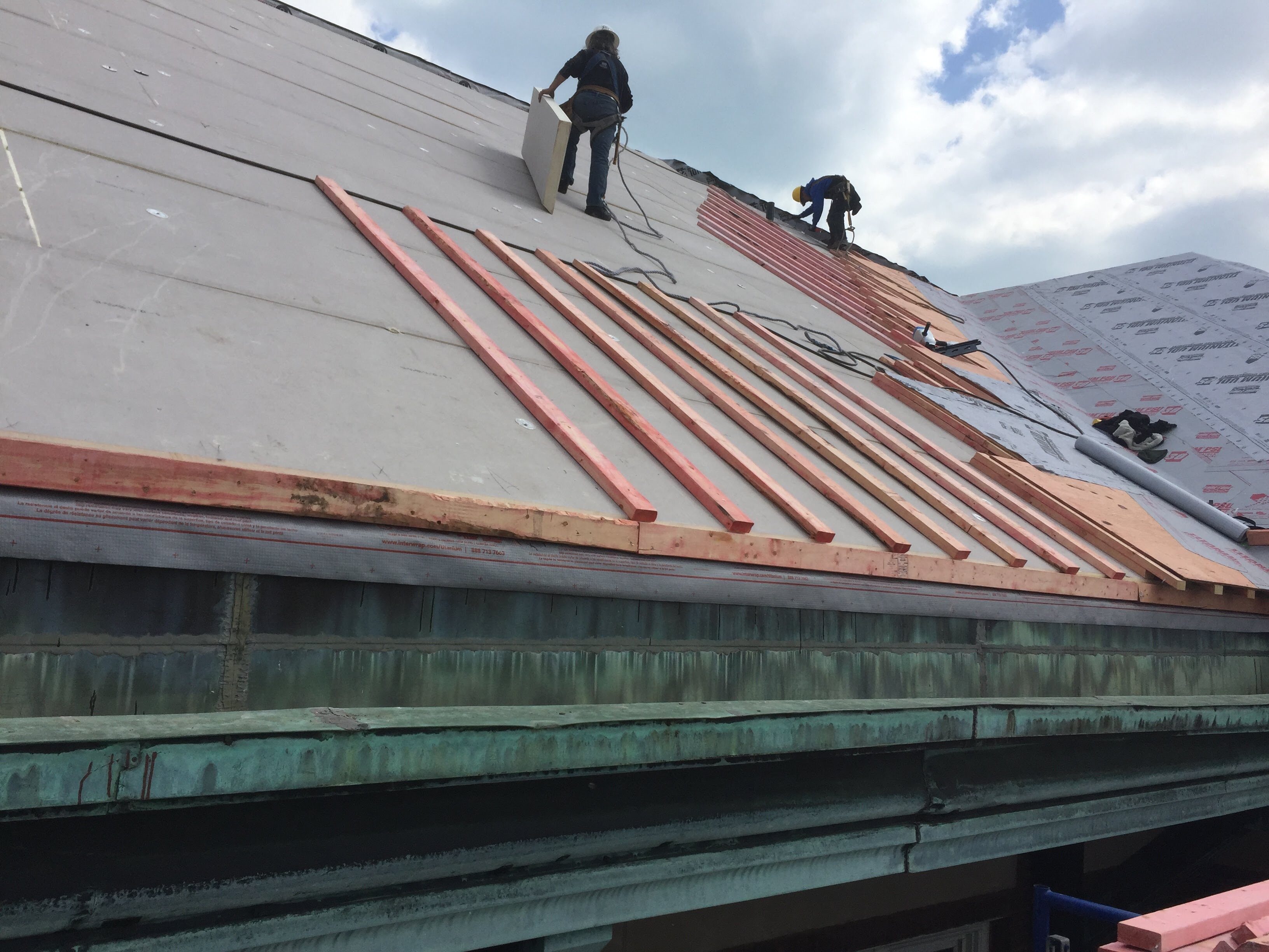 Champion Roofing contractors replacing a residential roof in Chicagoland area. 